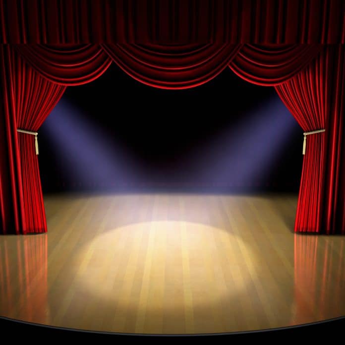 Theatre stage with red curtain