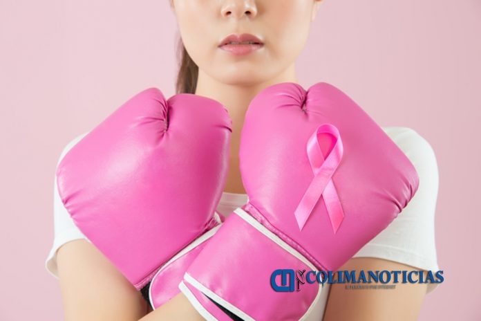 Chinese girl wear boxing gloves crossed arms