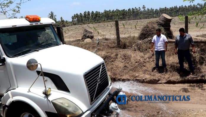reparan camino en armeria