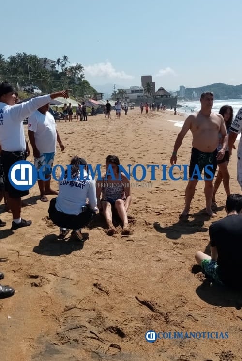 Guardavidas voluntarios salvan a 3 de las corrientes marinas5