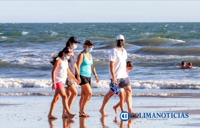 turistas playas covid
