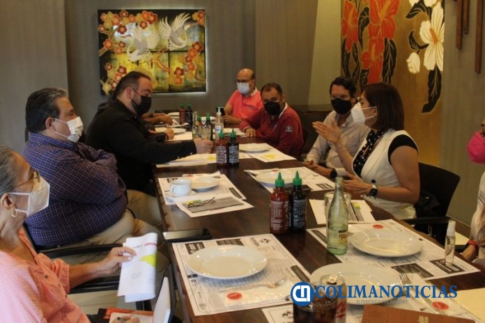 acciones salud y negocios reunion