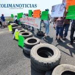 Vecinos de Coahuayana bloquean puente; piden que aparezca joven estudiante