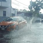 autos en lluvia colima