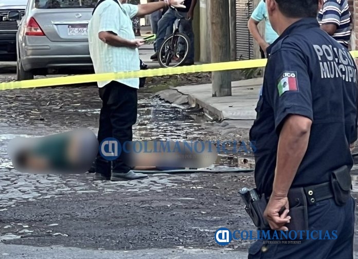 muerto en tecomán